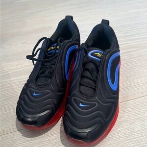 Nike Black Sneakers with Blue Accents and Red Sole